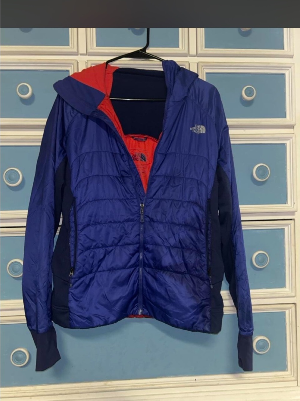 The North Face Women's Blue Hooded Puffer Jacket with Red Lining